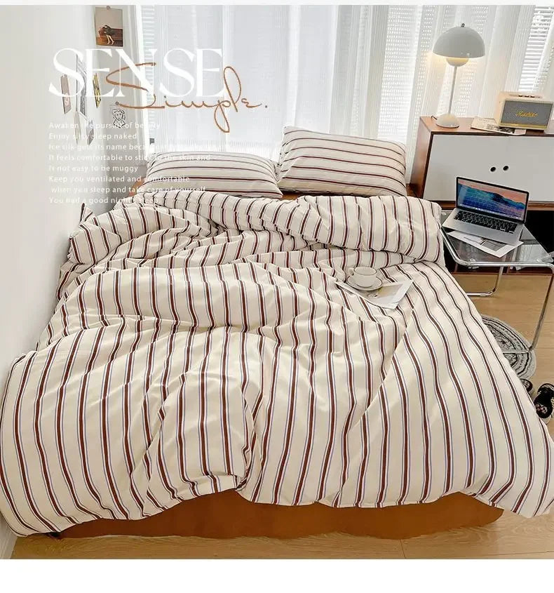 Simple Red and Blue Striped Duvet Cover and Four Piece Bed Sheet Set with Washed Cotton Bedding on the Bed